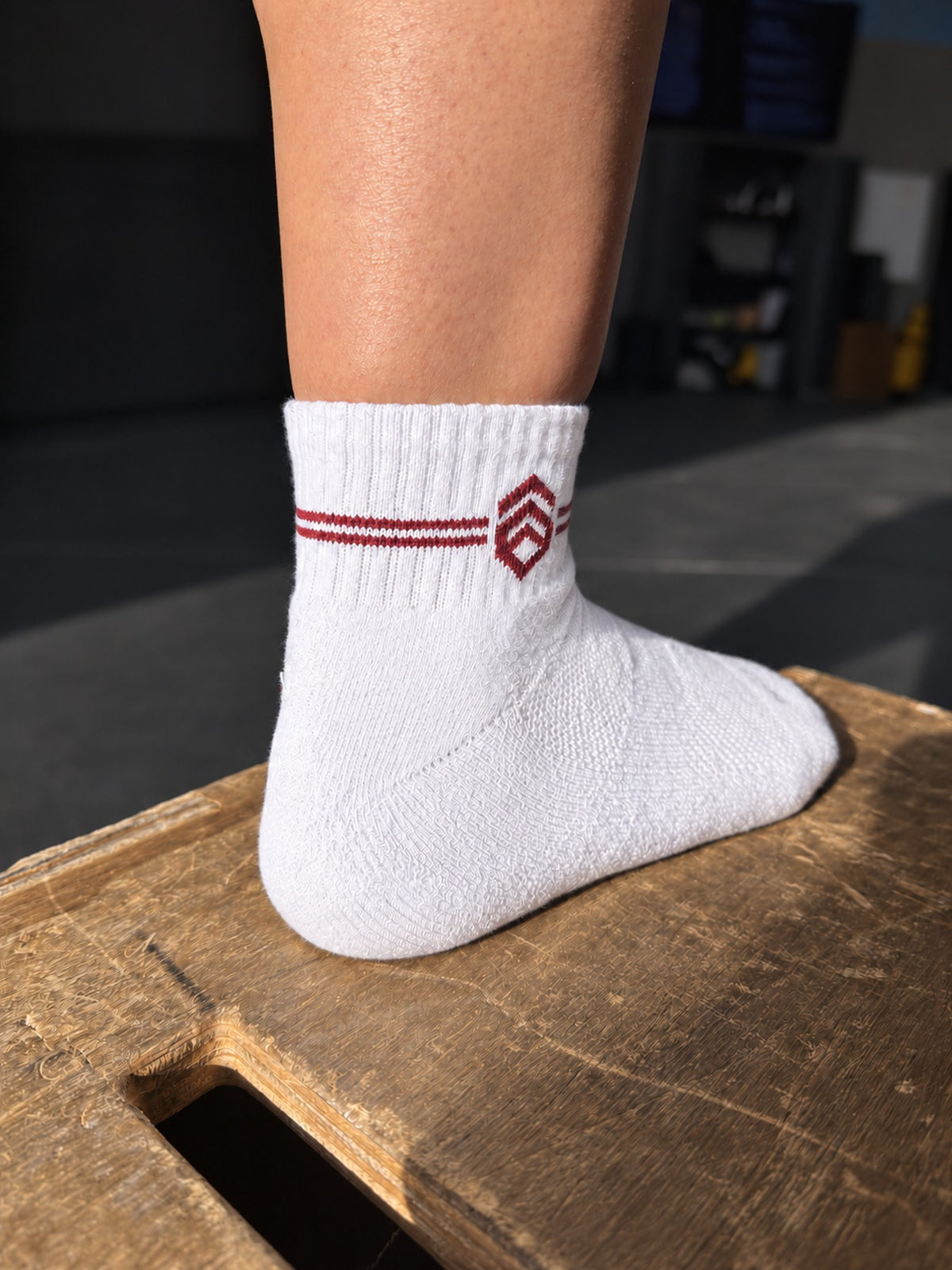 White quarter tall sock heel and branded cuff detail